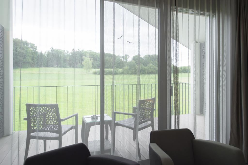 Small Luxury Hotel Wellnesshotel Golfpanorama Lipperswil Bagian luar foto